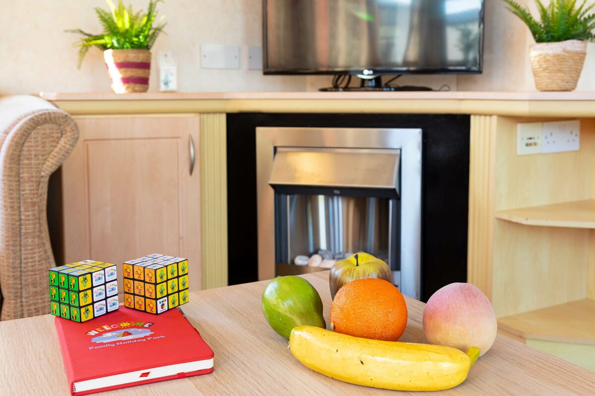 Fruit on the table in the Blue Reef Caravan at Welcome Family Holiday Park