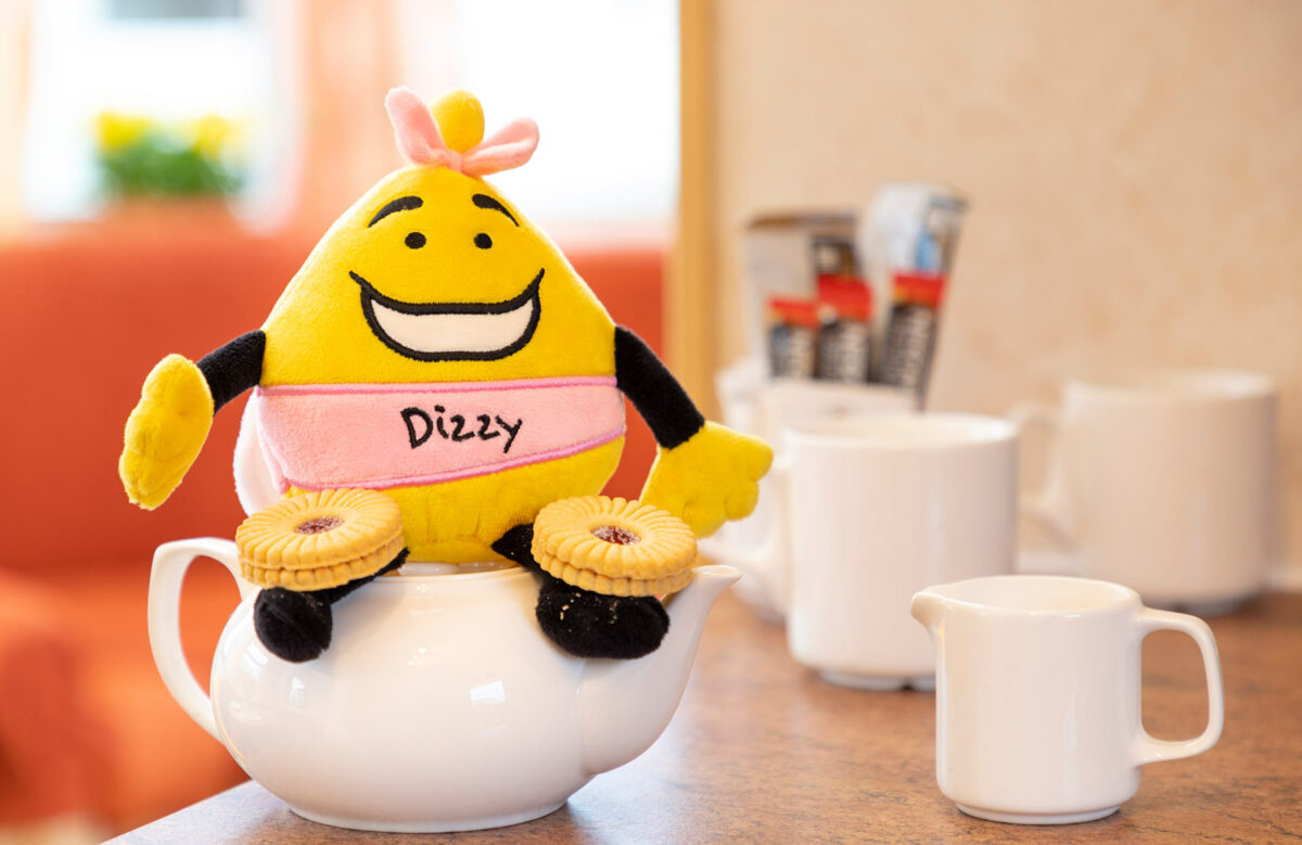 Tea and biscuits for Dizzy in the Sunset caravan at the Welcome Family Holiday Park