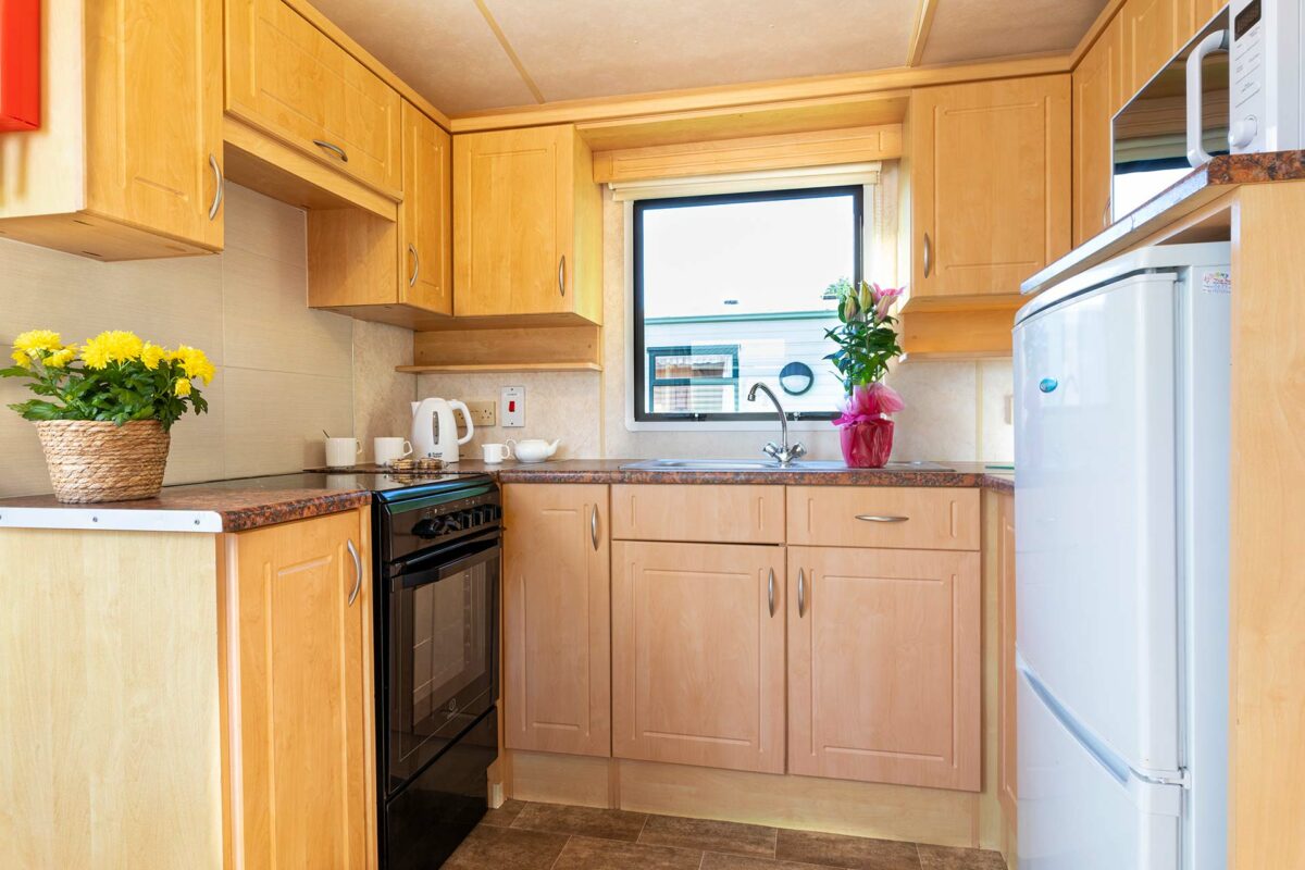 Kitchen in the Blue Reef Caravan at Welcome Family Holiday Park
