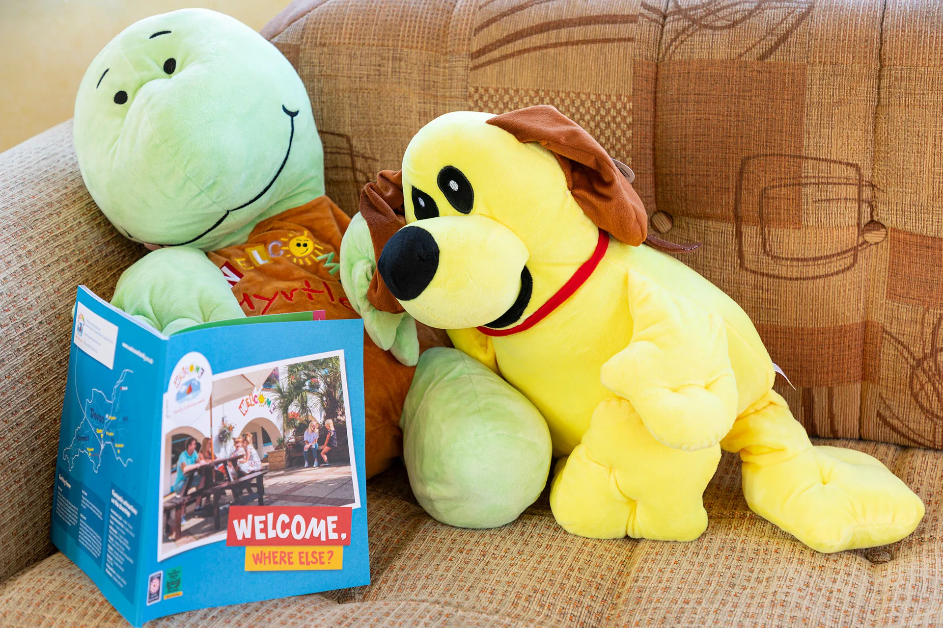 Reading the brochure in the Coral Reef Caravan at Welcome Family Holiday Park