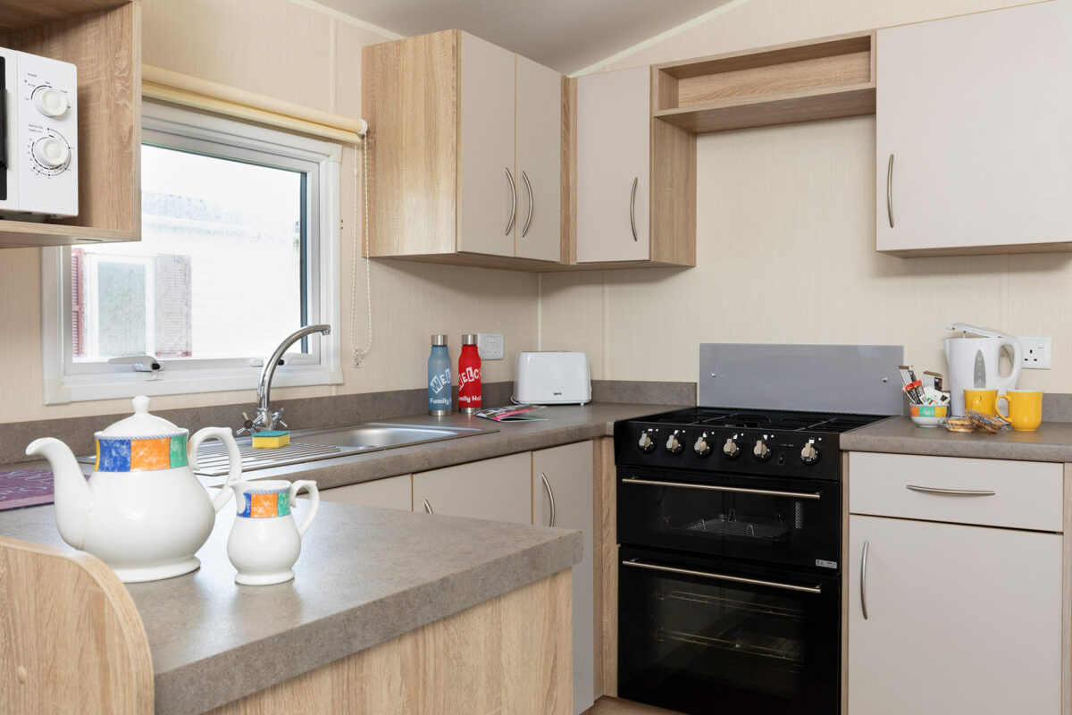 Clean and well equipped kitchenin the Casario premier caravan at Welcome Family Holiday Park