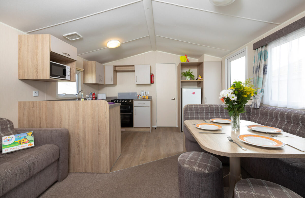 Clean and light kitchen dinerin the Casario premier caravan at Welcome Family Holiday Park