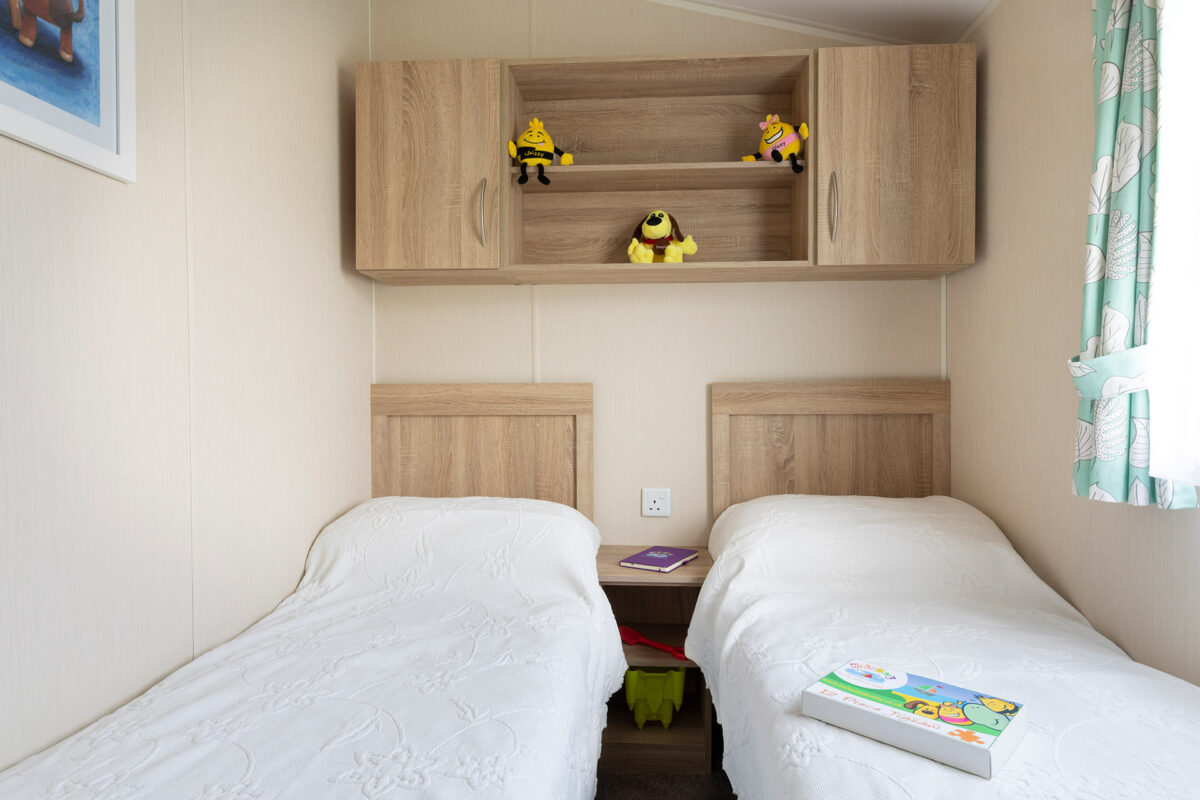 Fun twin bedroomin the Casario premier caravan at Welcome Family Holiday Park