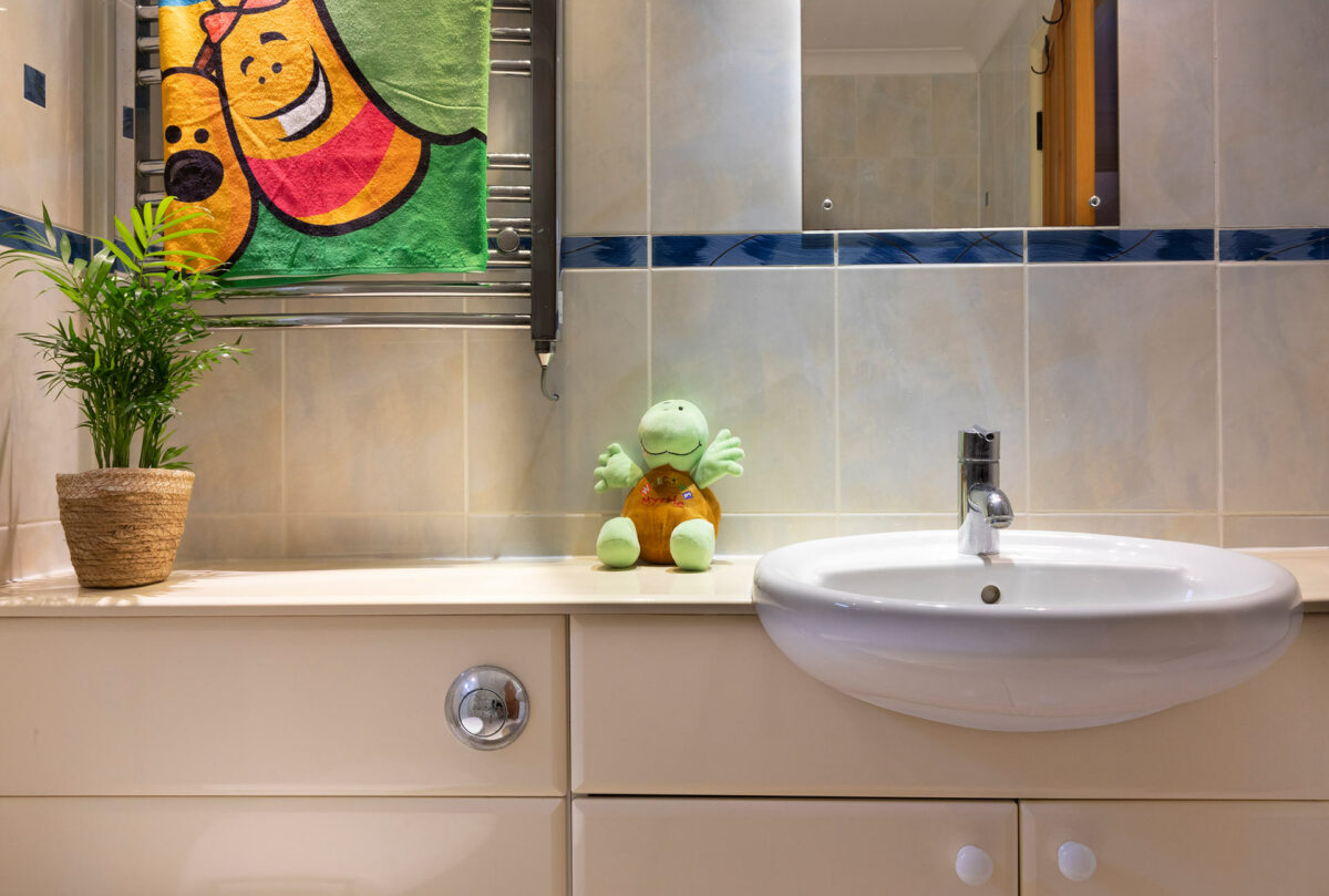 Myrtle in the bathroom in the Casita lodge at Welcome Family Holiday Park