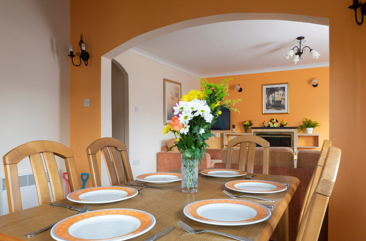 Dining table all set in the Casita lodge at Welcome Family Holiday Park