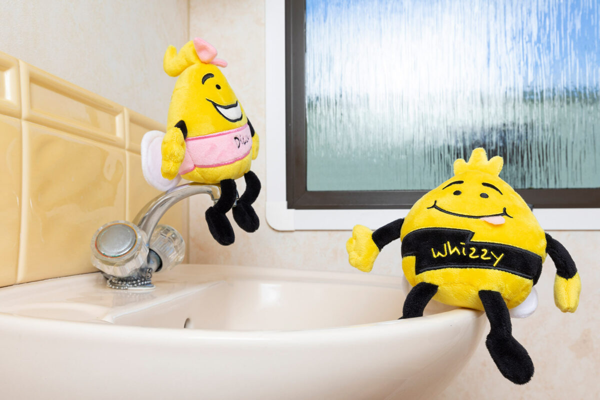 Dizzy and Whizzy in the bathroom in the Blue Reef Caravan at Welcome Family Holiday Park