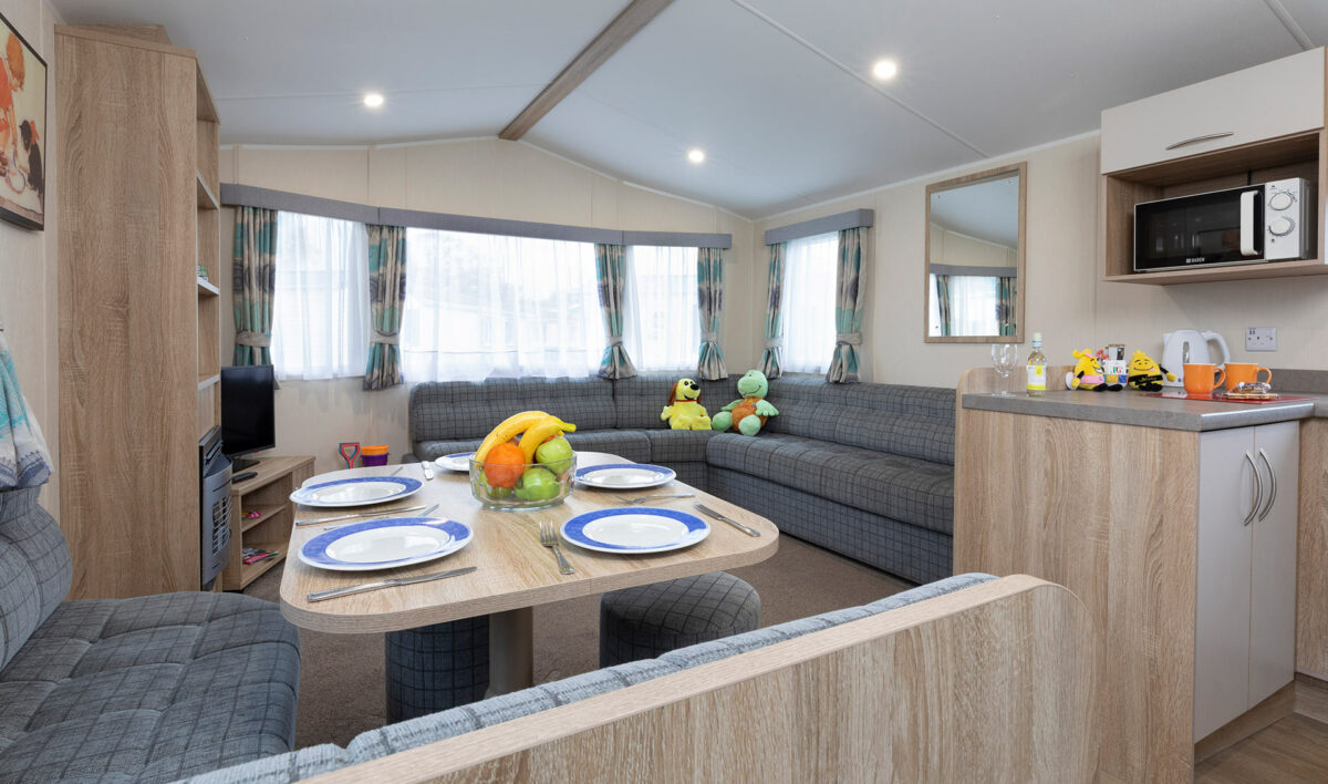 Dining area all ready for lunch in the CasaMor premier caravan at Welcome Family Holiday Park