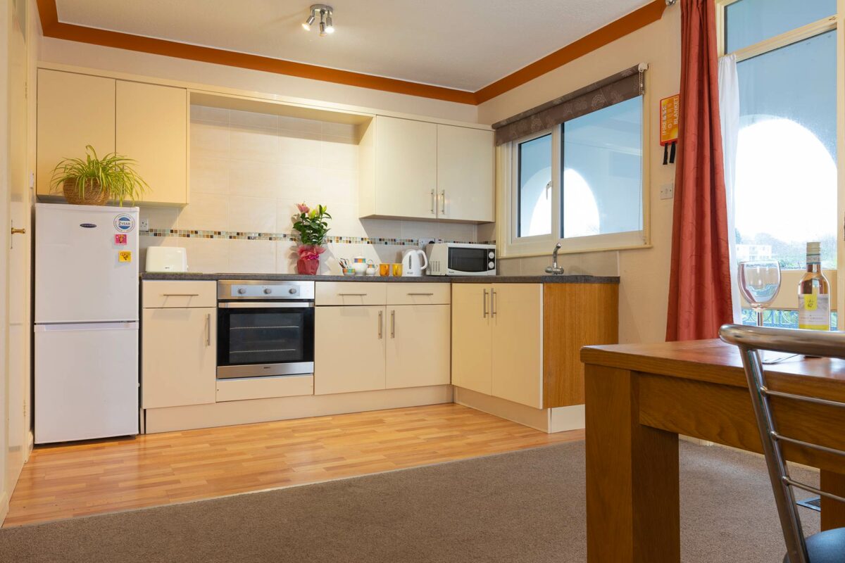 Light and bright kitchen area in the Arriba Apartment at Welcome Family Holiday Park