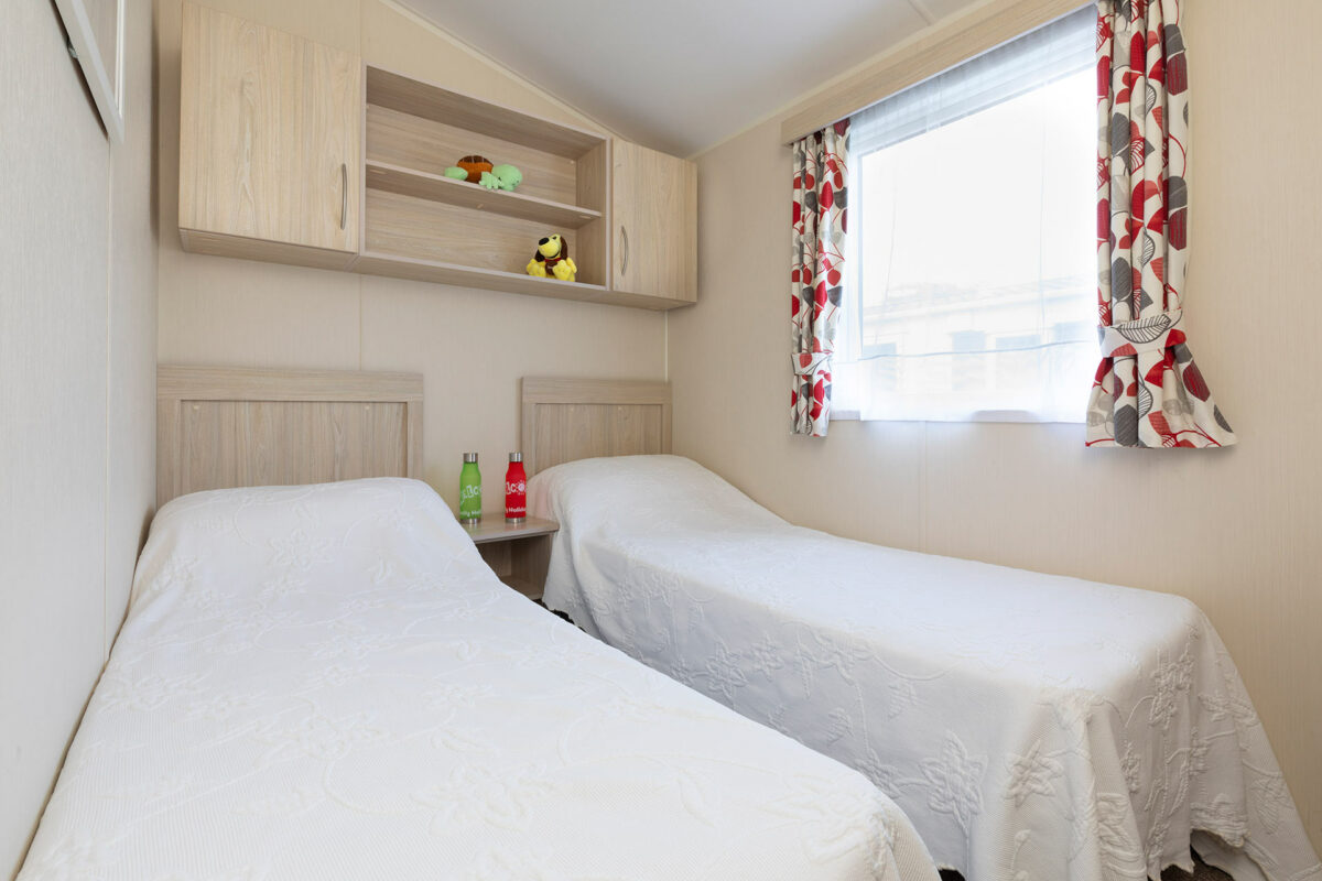 Fun twin bedroom in the Casario premier caravan at Welcome Family Holiday Park