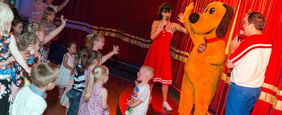 Dougie Dog and the entertainers on stage at Welcome family Holiday Park