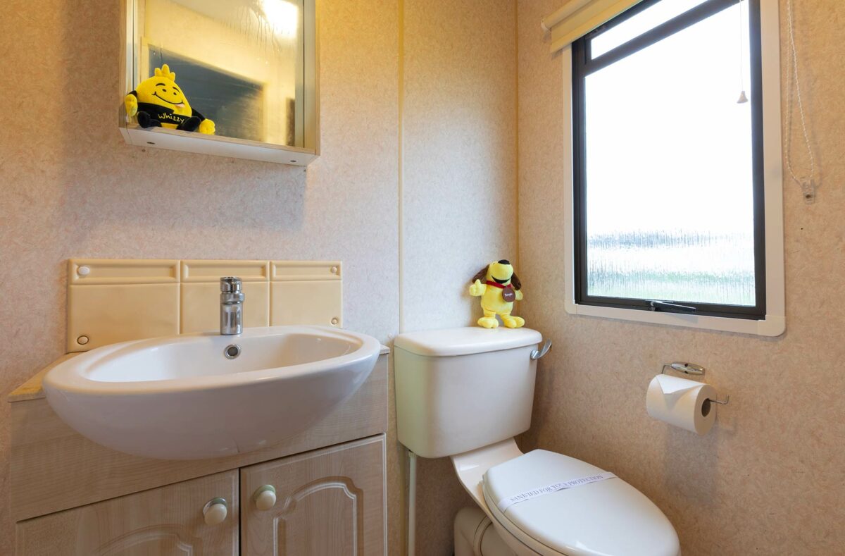 Clean and bright bathroom in the Moonlight caravan at Welcome Family Holiday Park