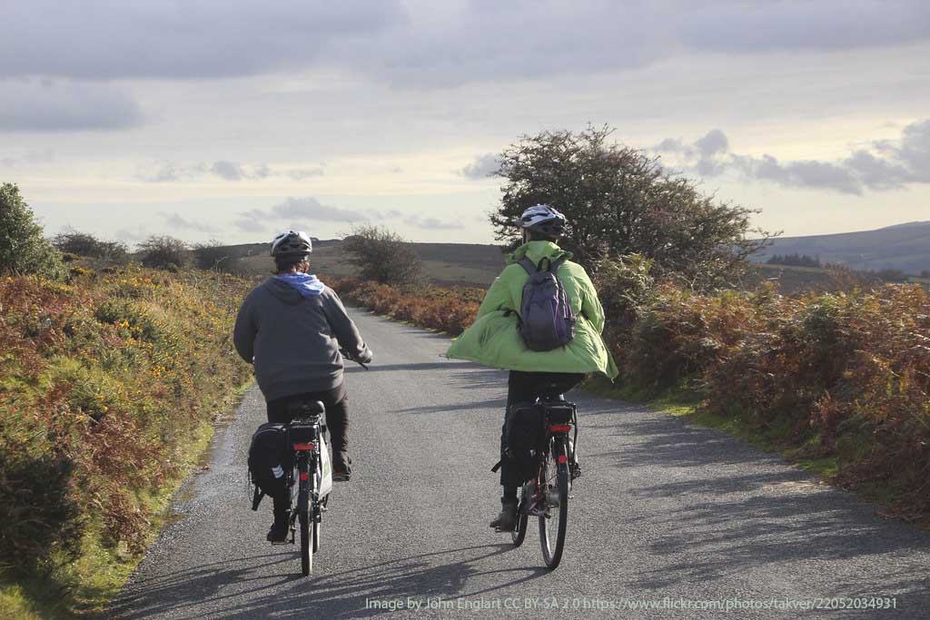 http://Couple%20cycling%20on%20Dartmoor