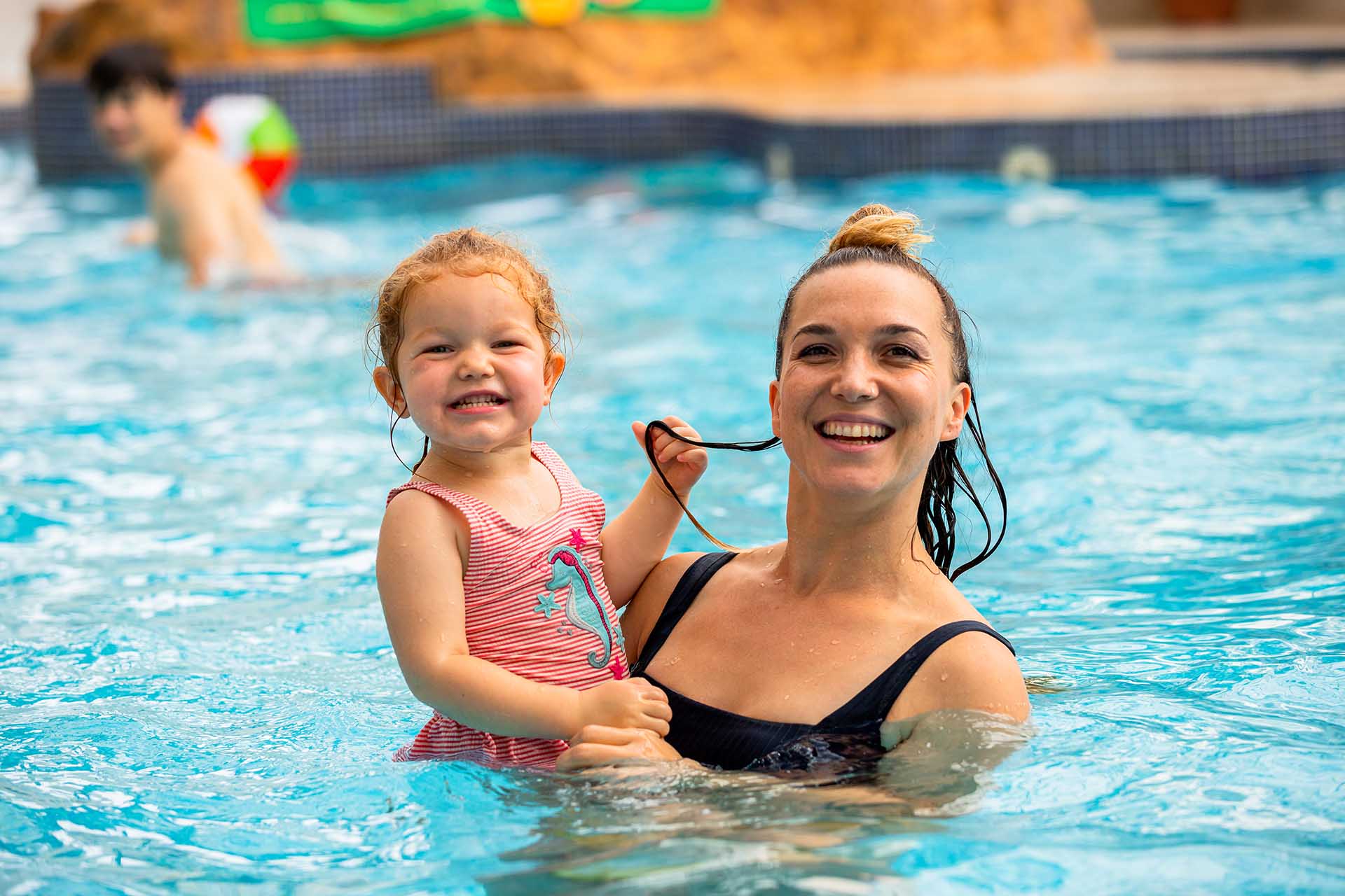 Mum and daughter enjoying the heated indoor swimming pool at Welcome