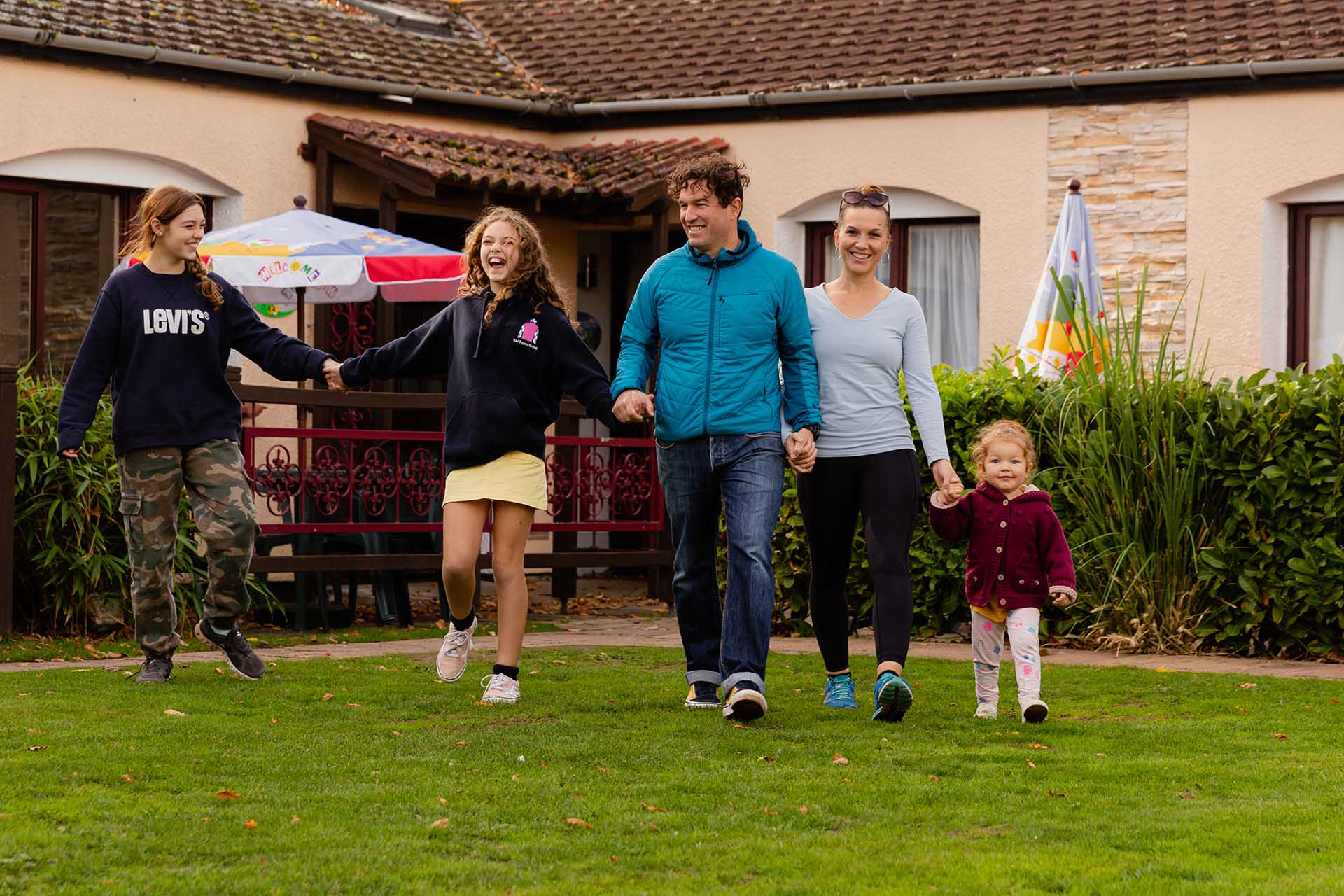 Family setting out from Welcome accommodation