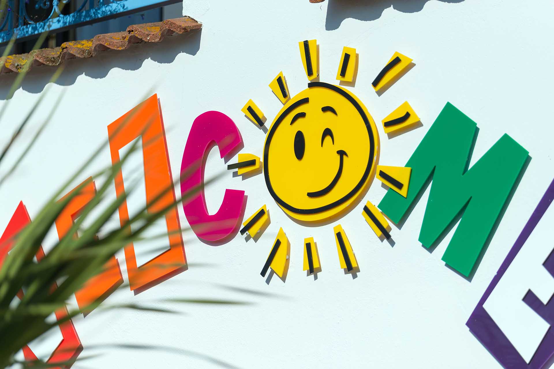 Welcome Reception Smiling Sun Logo