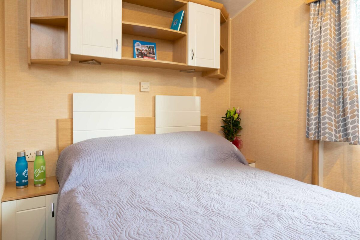 Clean and airy double bedroom in the Silver Reef at Welcome Family Holiday Park